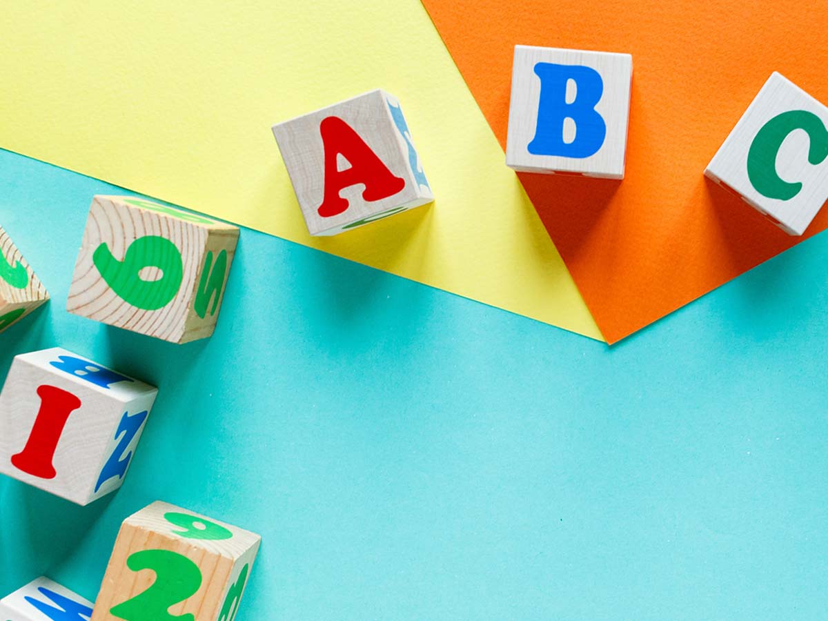 abc blocks on a colorful foam mat
