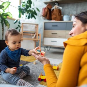child with wooden blocks