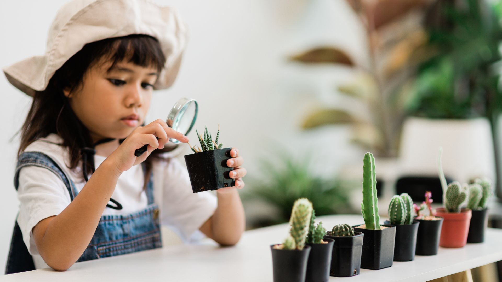 young girl examining plants