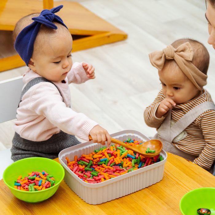 young kids with pasta game