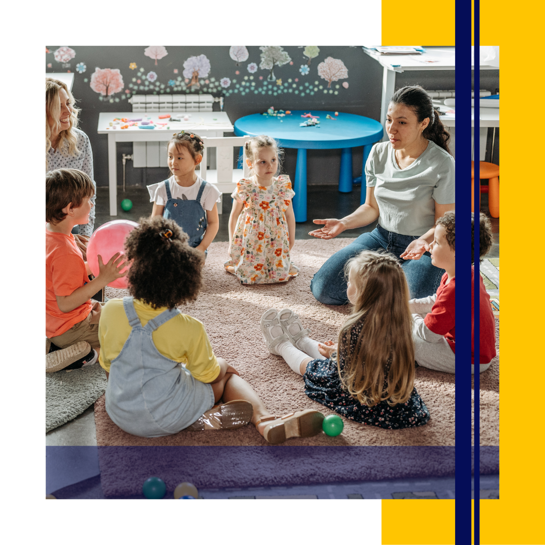 School teachers talking with seated students
