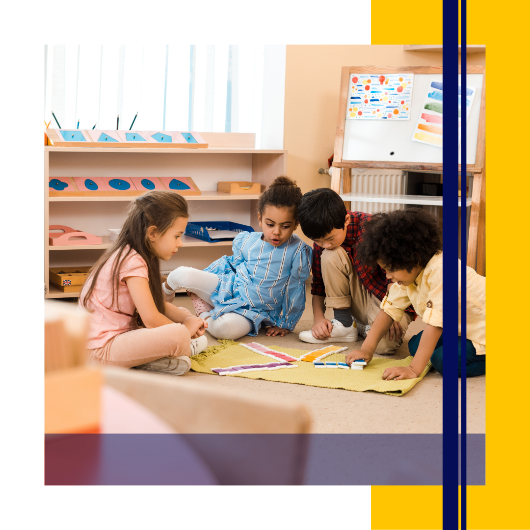 Four children in classroom doing an activity together