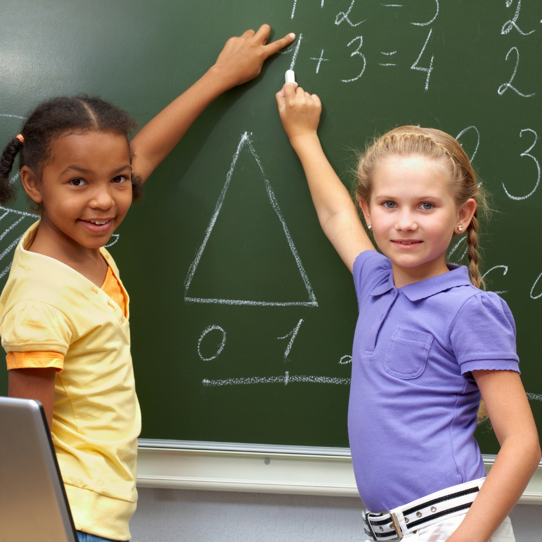 images of two kids working on math