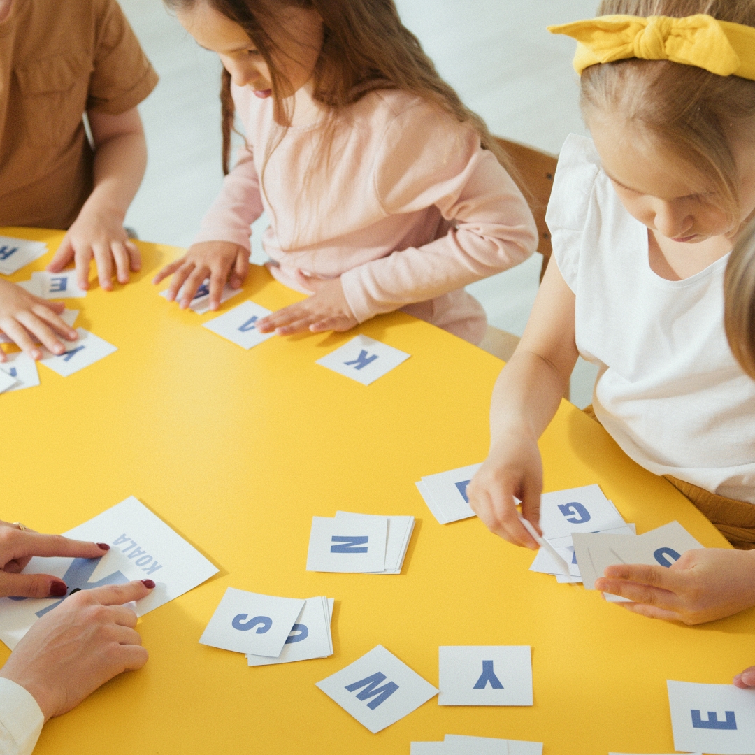 image of kids learning letters