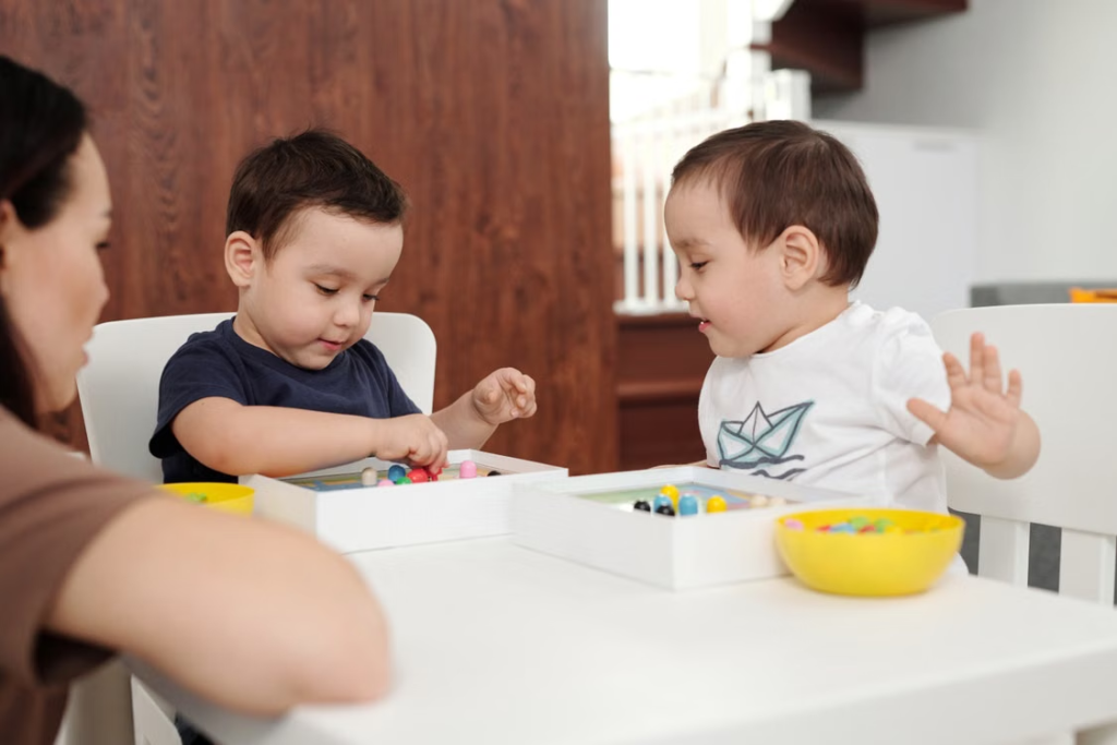 Two young children making choices while playing together indoors.